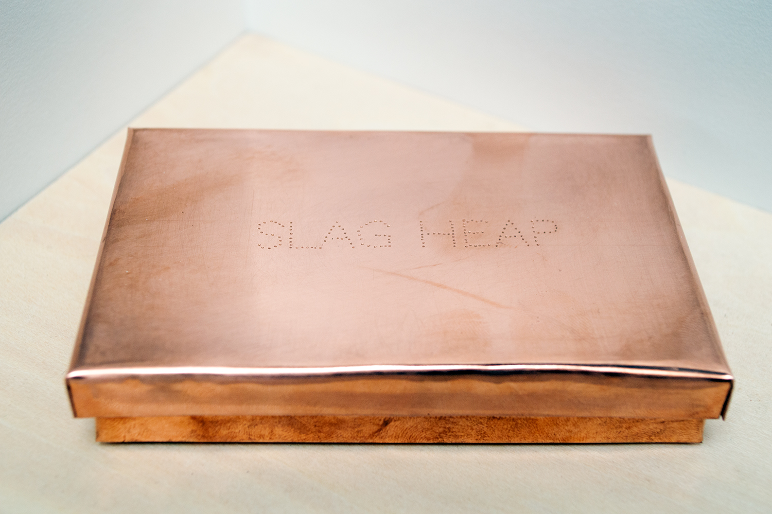 Slim copper box with text
