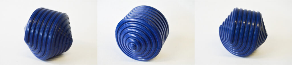 Resin cast stim toy. In a shade of blue with a closer spiral pattern.