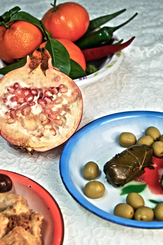 picture of fruit and olives on plates